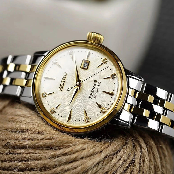 SEIKO PRESAGE COCKTAIL TIME WHITE LADY DIAMOND TWIST AUTOMATIC LADIES WATCH – 30.3MM CHAMPAGNE DIAL GOLD-TONE BRACELET