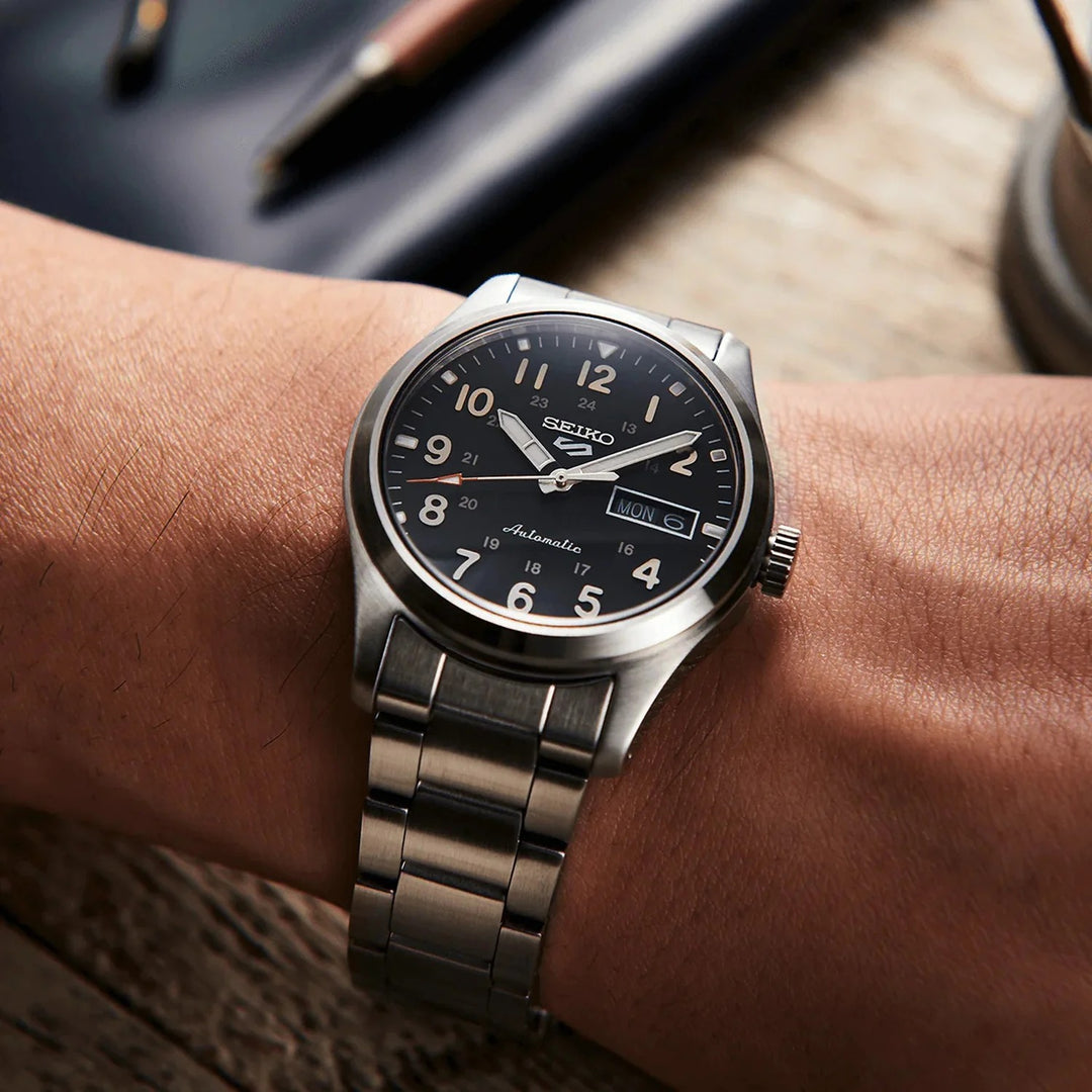 SEIKO 5 SPORTS FIELD AUTOMATIC WATCH – 39.4MM BLACK ARABIC DIAL STEEL BRACELET